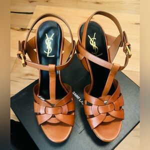 Yves Saint Laurent YSL Triomphe heels… never worn. Dust bags and box included.